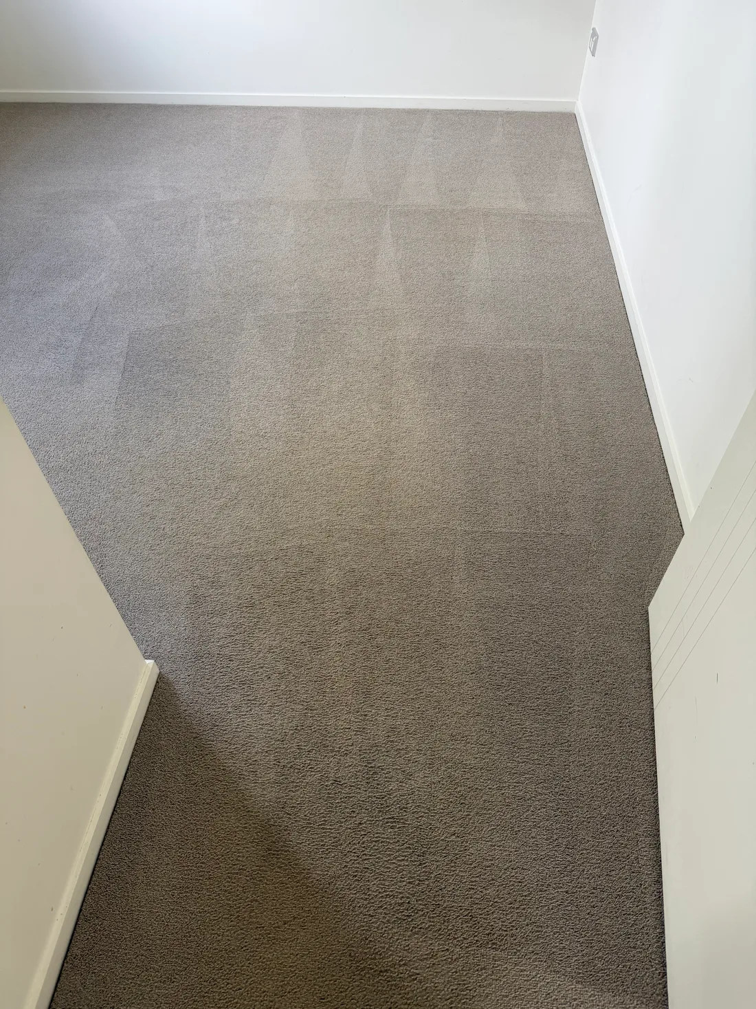 The same master bedroom carpet after cleaning and extraction